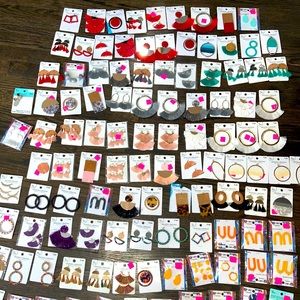 121 pieces of brand new pendants. Multi-colored with 2 pieces included in most